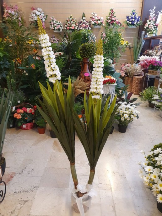 yuca artificial con flor para envío a domicilio